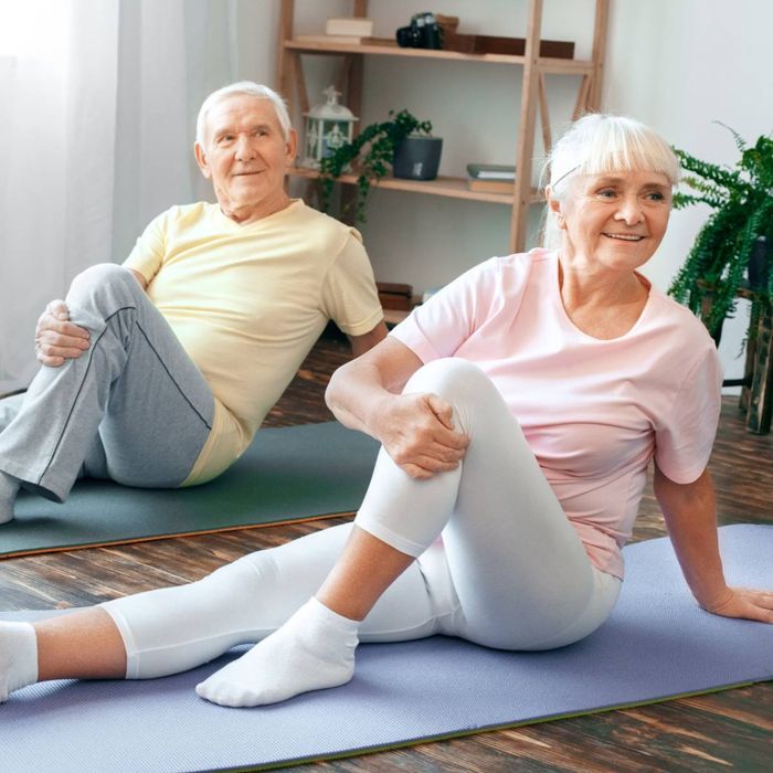 male and female senior citizens exercising