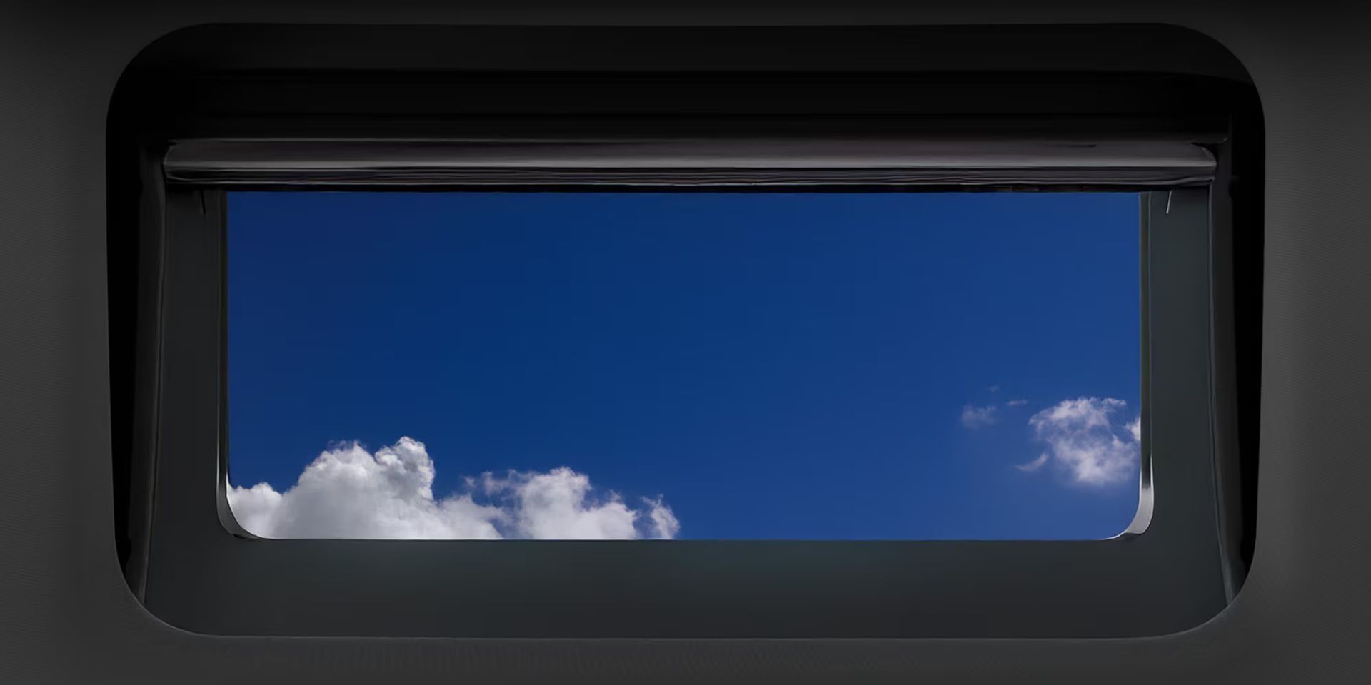 Tinted sliding sunroof.