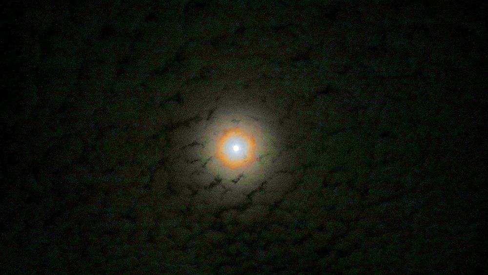Moon Rings behind the Clouds