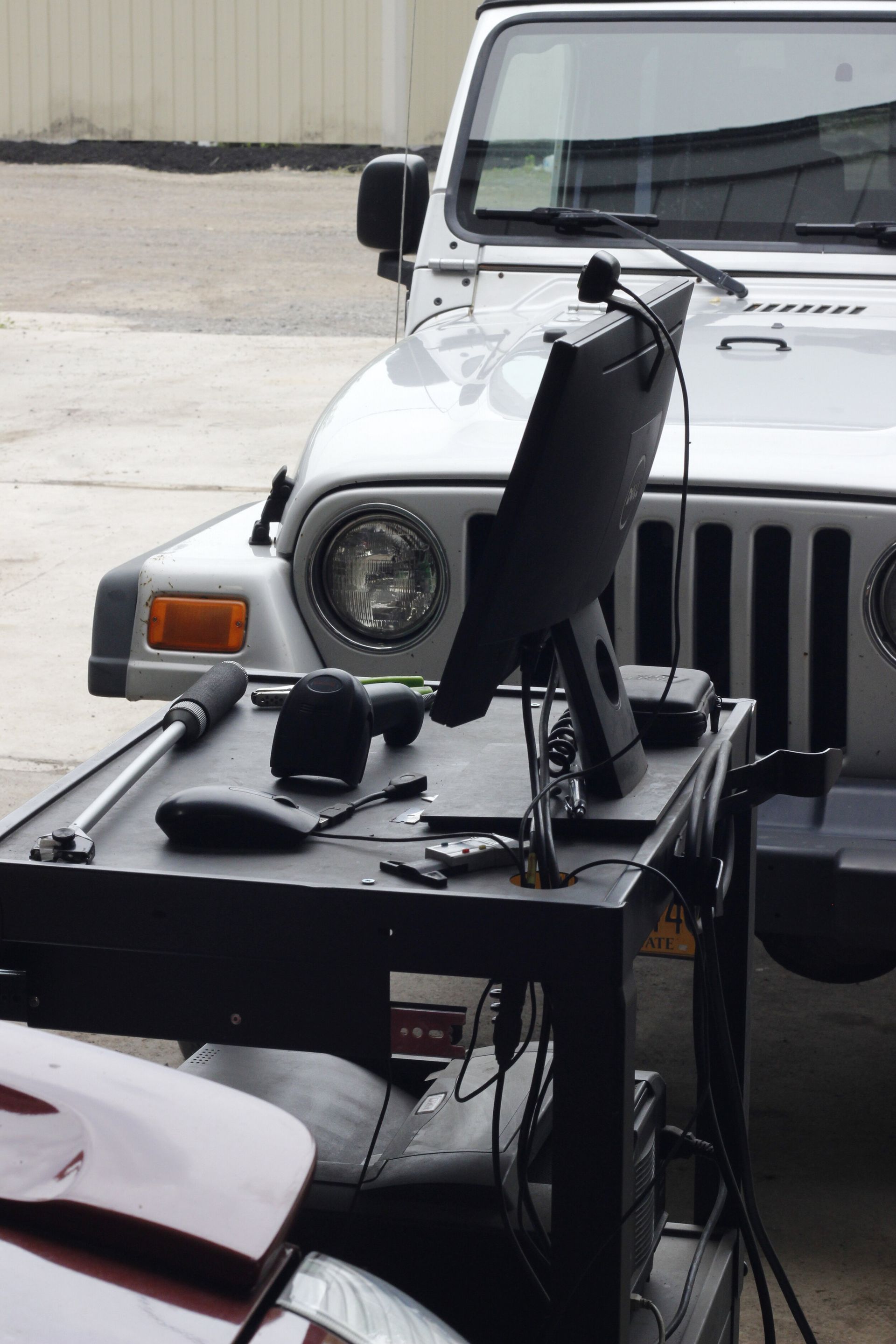 Inspection tools in front of vehicle