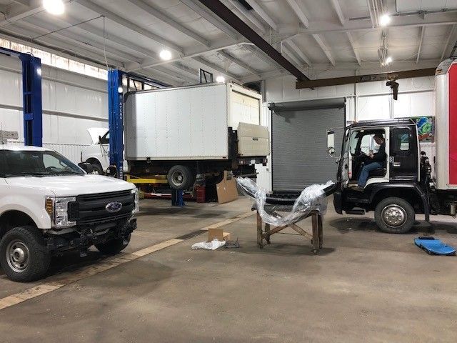 Trucks in shop