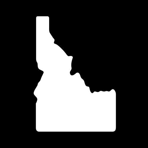 A white silhouette of the state of idaho on a black background.