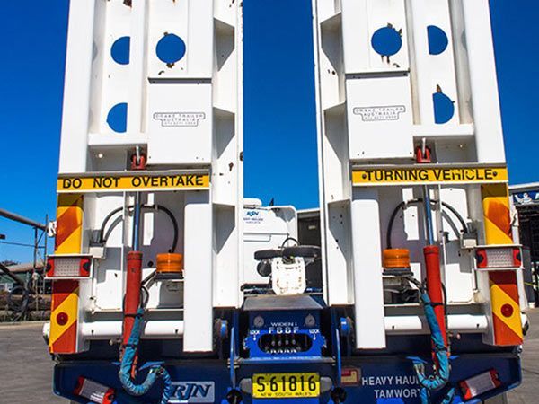 The Back Of A Semi Truck With A Do Not Overtake Sign On It — RJN Transport In Armidale, NSW