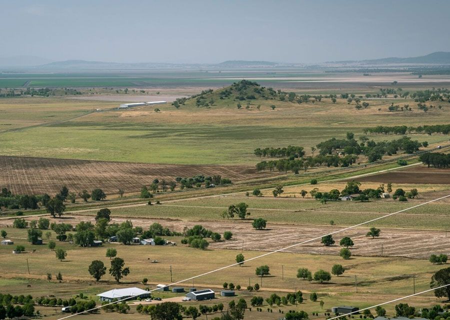 An Aerial View Of A Lush Green Field With A House In The Middle — RJN Transport In Gunnedah, NSW