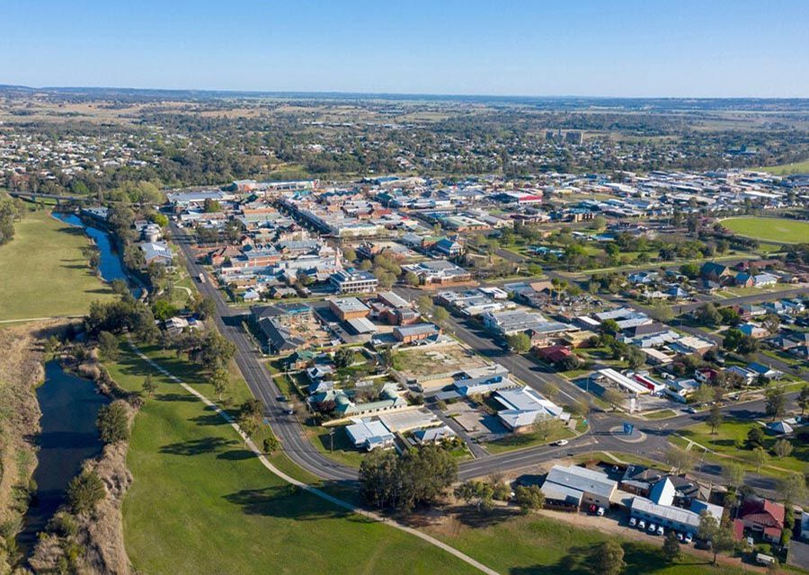 An Aerial View Of A Small Town With A River Running Through It — RJN Transport In Inverell, NSW