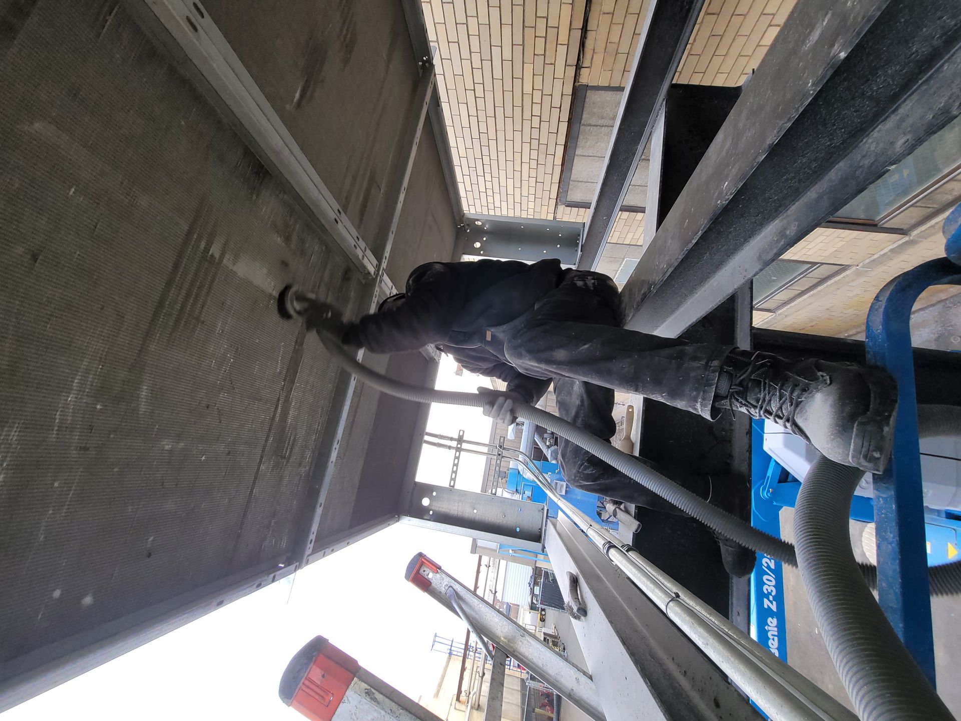 Man Cleaning Air System  — Springfield, MA — Advanced Air Quality, Inc.