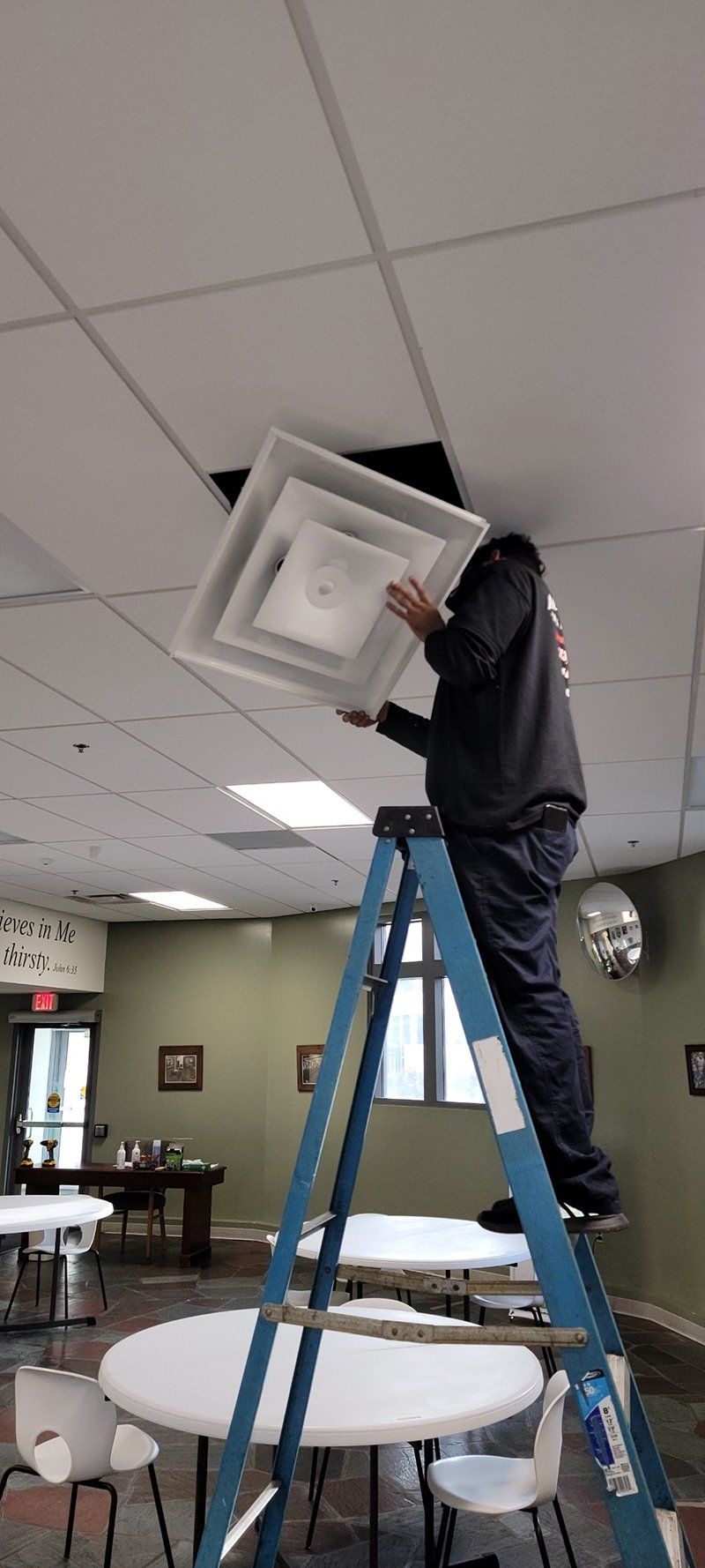 Worker Installing Back The Air Duct — Springfield, MA — Advanced Air Quality, Inc.