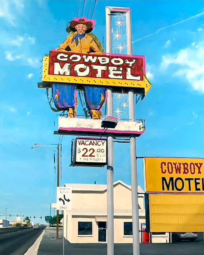 A cowboy motel sign with a cowboy on top of it