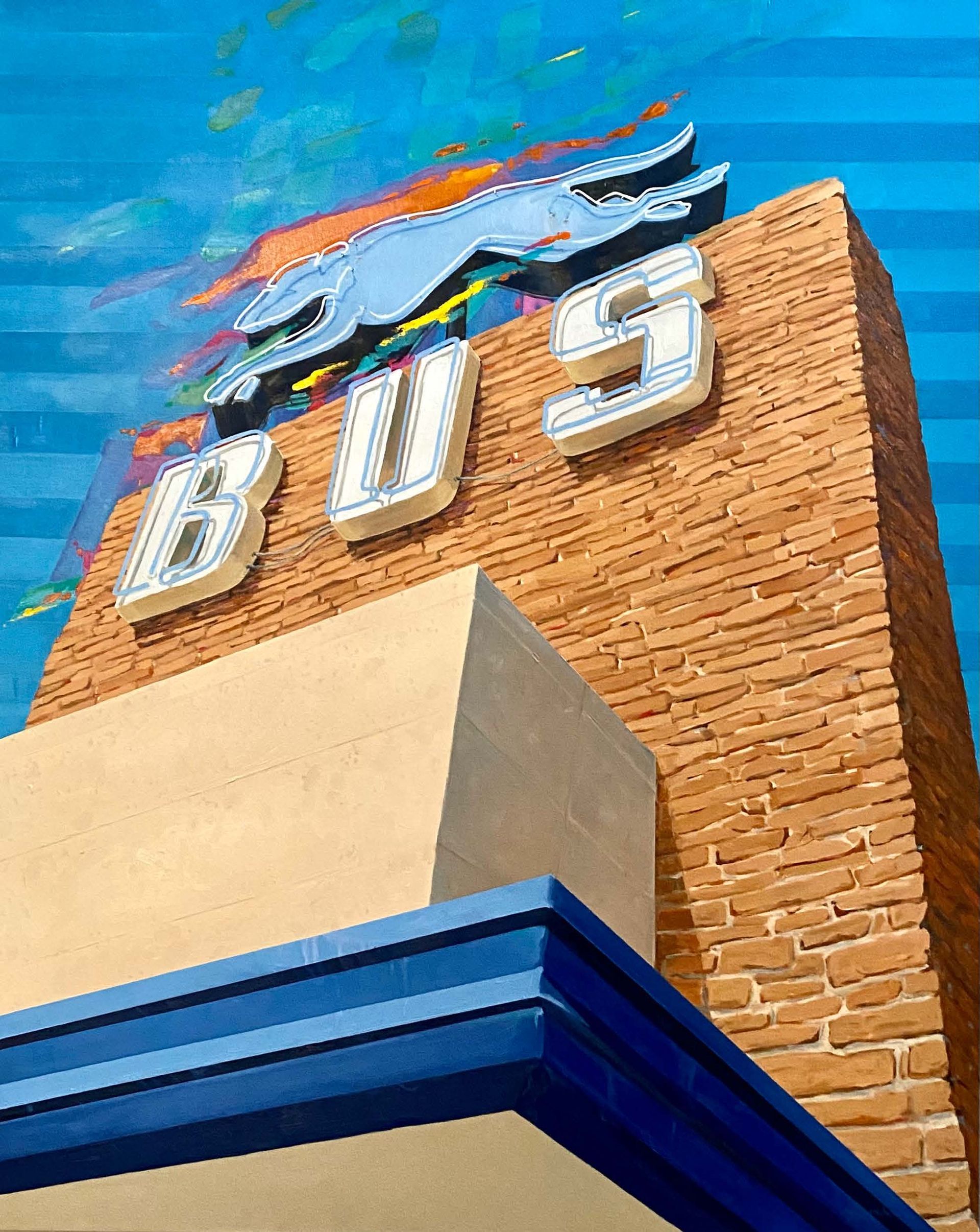 A brick building with the word bus on it