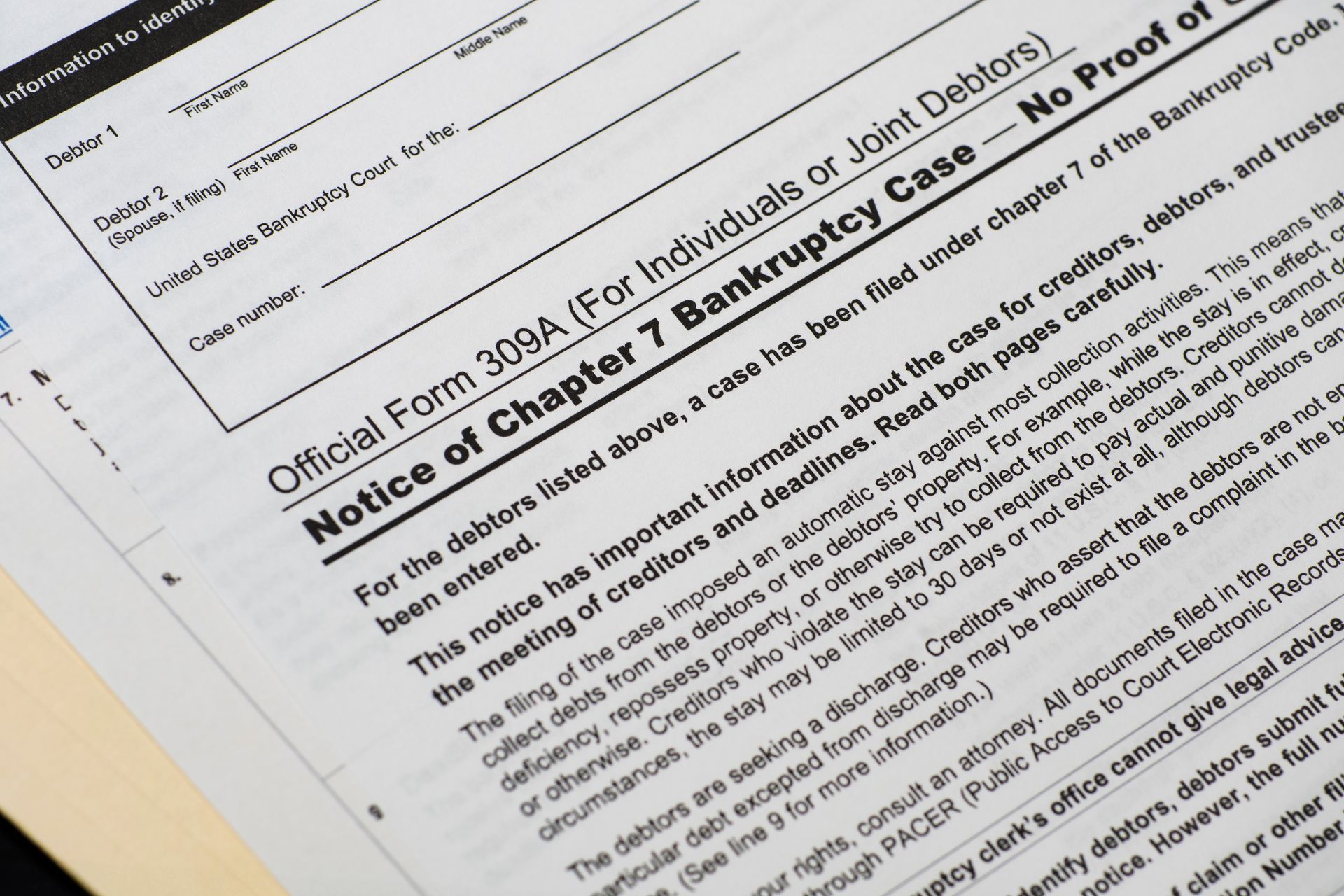 A close up of a notice of chapter 7 bankruptcy case.