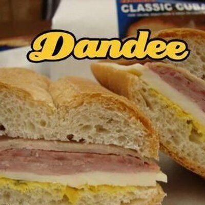 A close up of a dandee classic cubano sandwich on a plate
