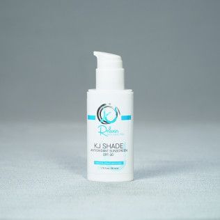White skincare bottle with pump dispenser; KJ SHADE sunscreen, SPF 35.