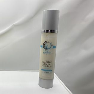 White tube of lash serum on a fluffy, white surface;