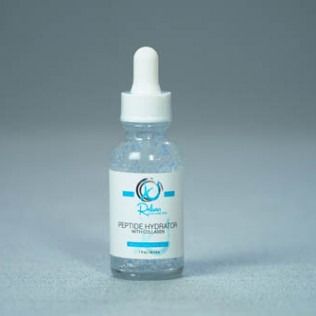 Clear glass bottle of serum with a white dropper. Blue liquid inside. White label.