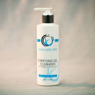 White Skin Care Pro bottle with blue accents, dispensing pump, and 