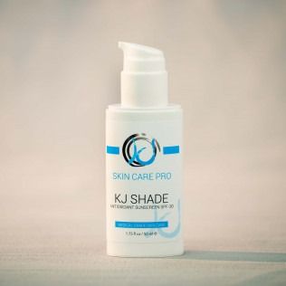 White skincare bottle labeled 