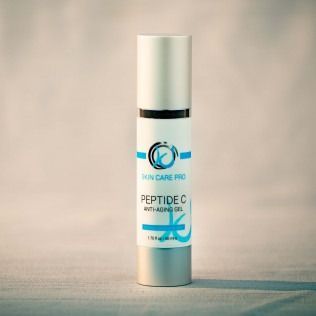 Skin Care Pro Peptide C anti-aging gel bottle. White, blue, and silver.