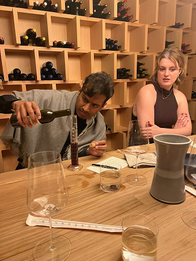 A vintage bottle of wine being unpacked and displayed