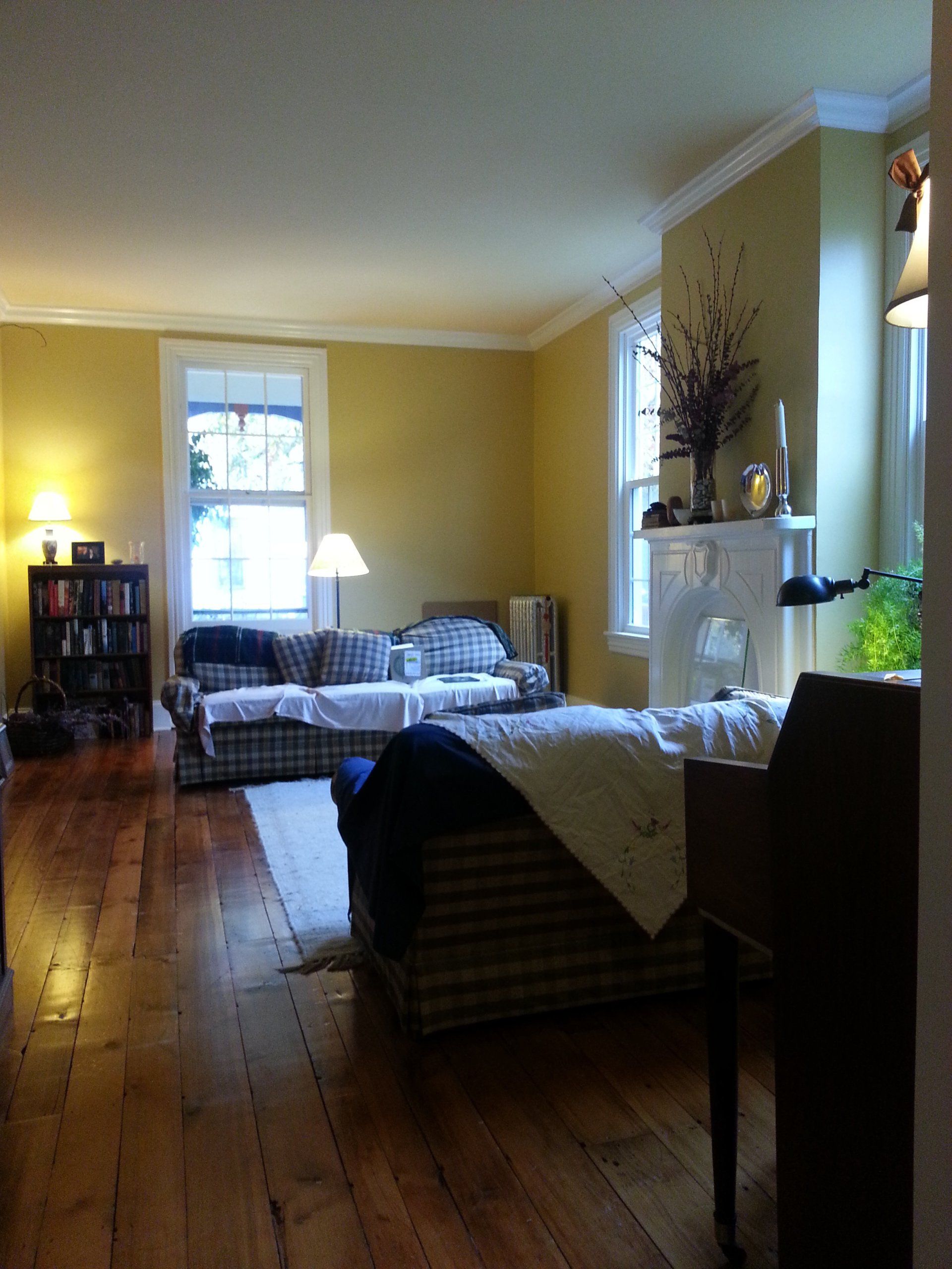 A living room filled with furniture and a fireplace