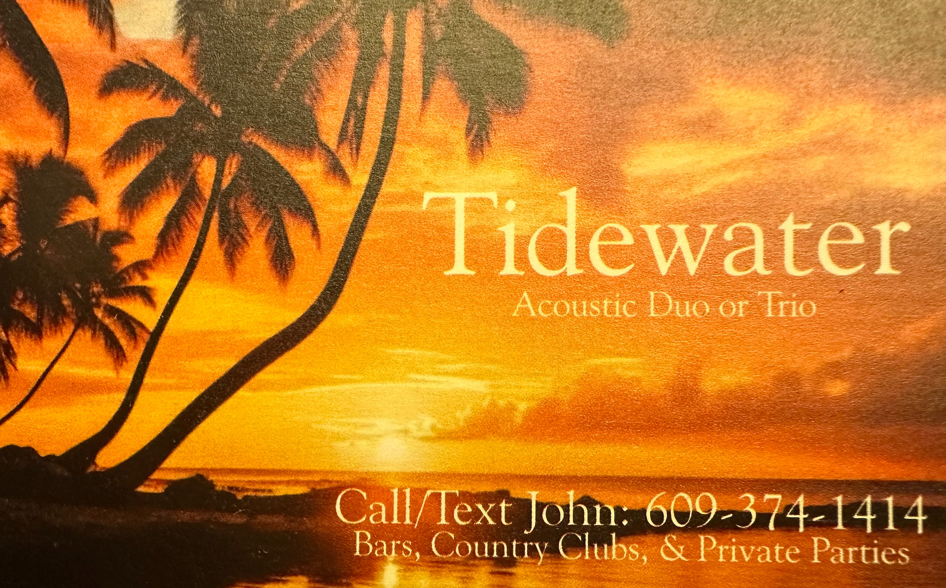 A business card for tidewater acoustic duo of inc.