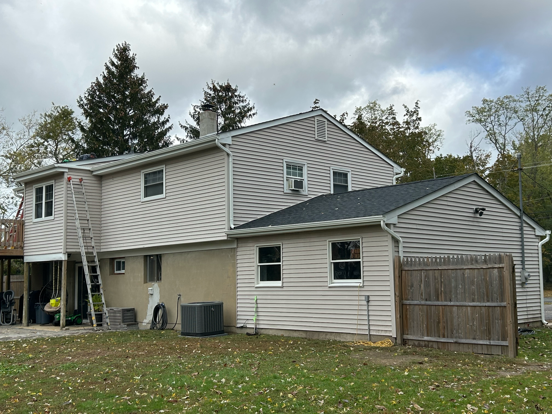 Residential home with new roofing, siding, and exterior upgrades shown in our gallery.

