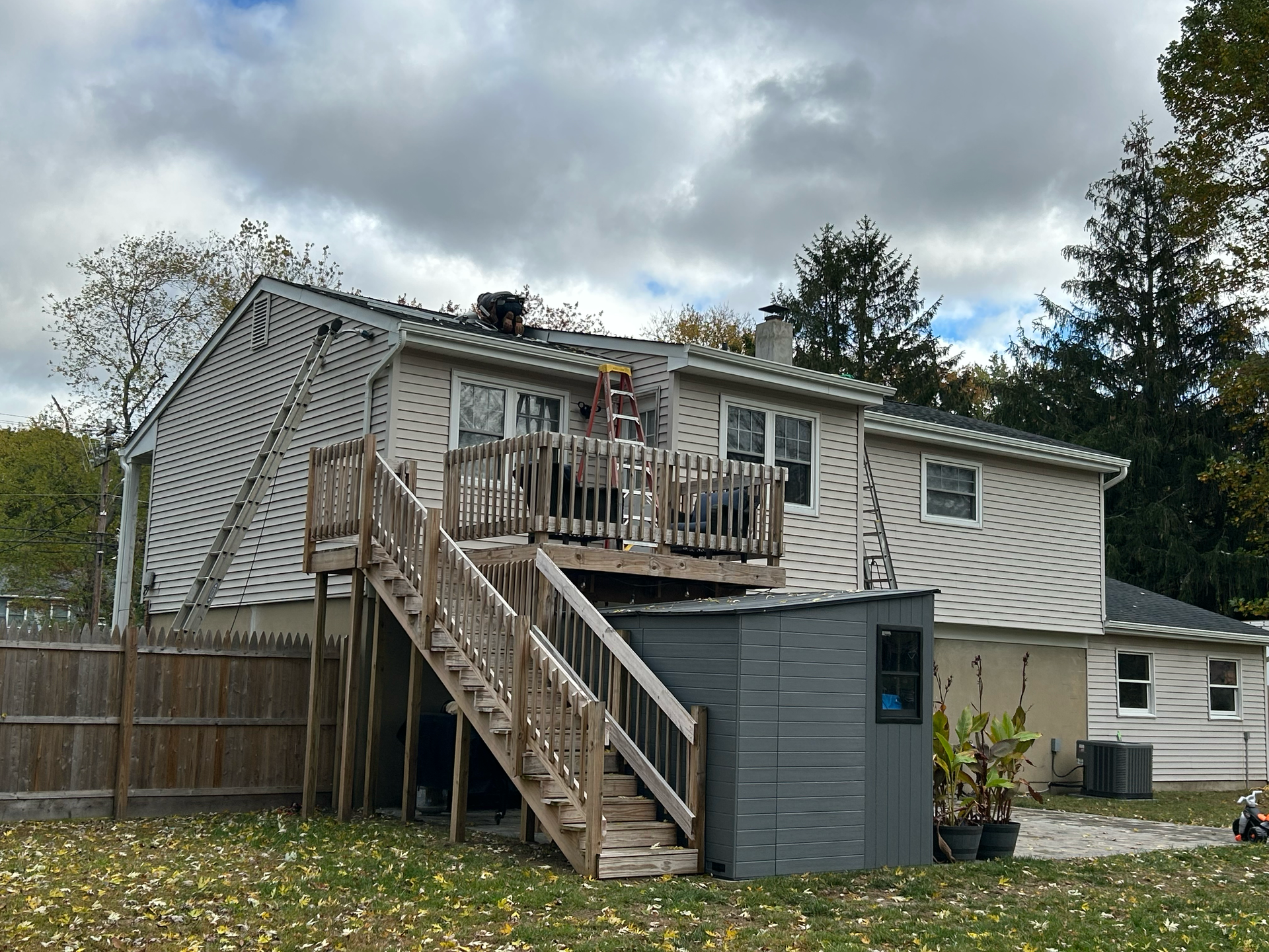 Two-story home with updated siding and exterior renovations featured in our project gallery.
