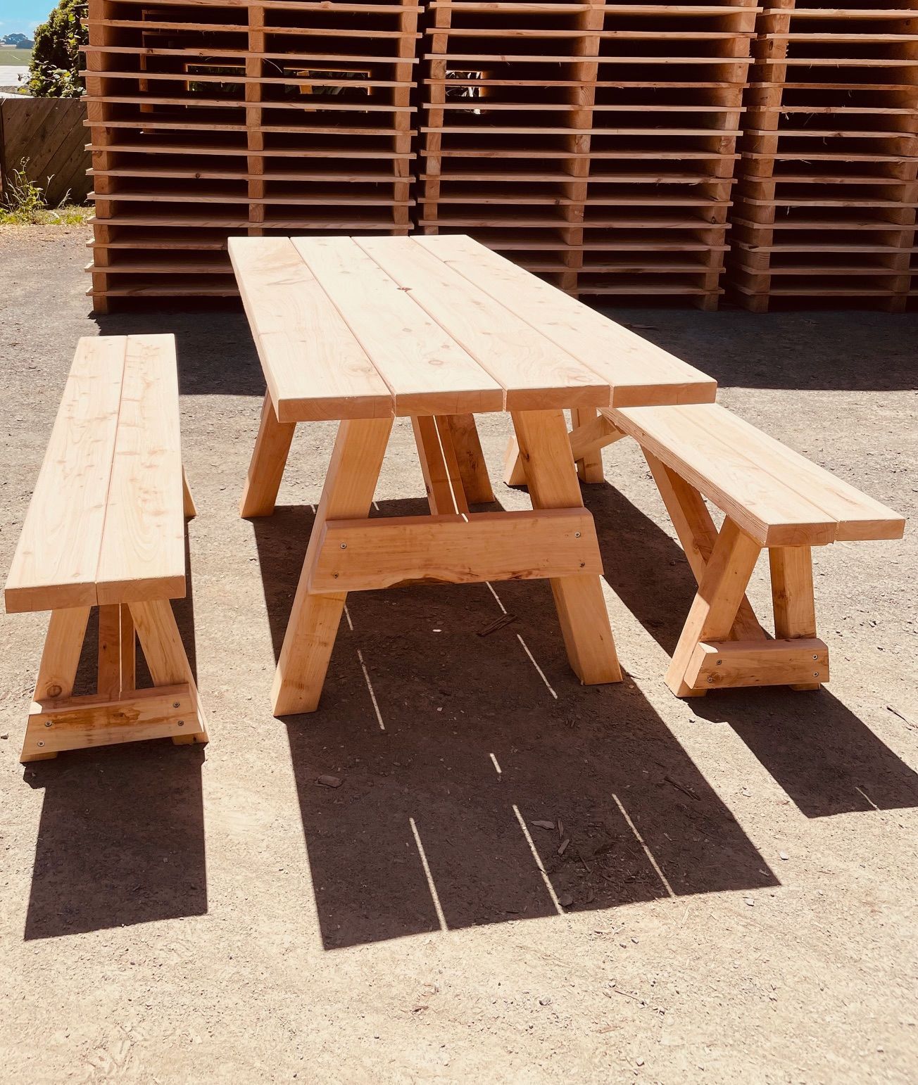 wooden tables and chairs for outdoor seating