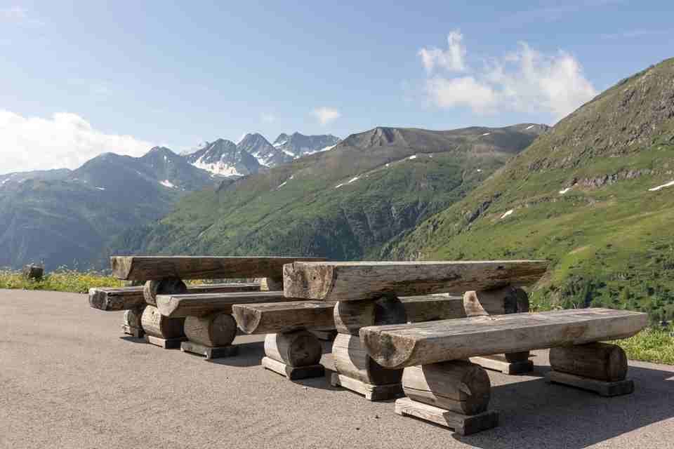 wooden tables and chairs for outdoor seating