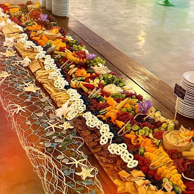 A long table with a lot of food on it