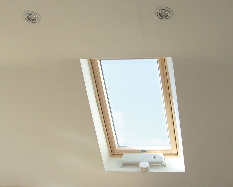 Internal conservatory skylight with electric opener