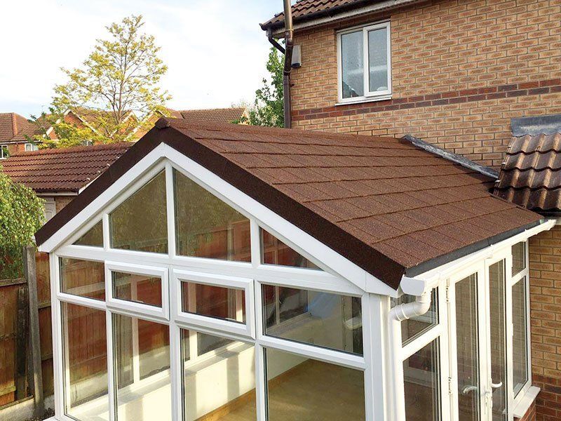Conservatory with a synthetic slate lightweight room