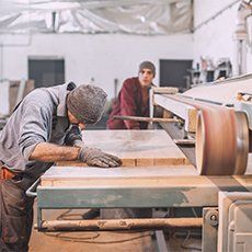 Carpenter Sanding a Wood — Youngstown, OH — Ace Lumber Co. Inc