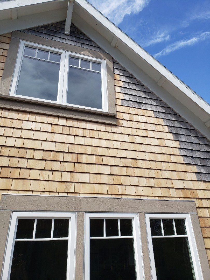 Roofing company in Long Beach, WA installing metal roofing for homes