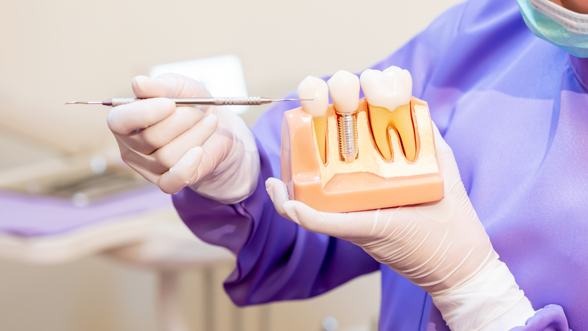 A close up of dental instruments with a tooth in the middle