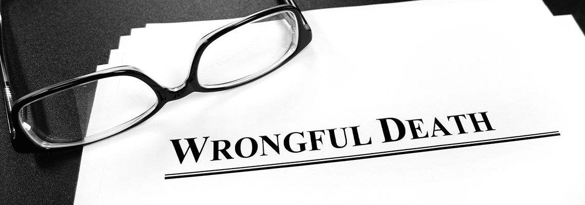 Wrongful Death written on paper