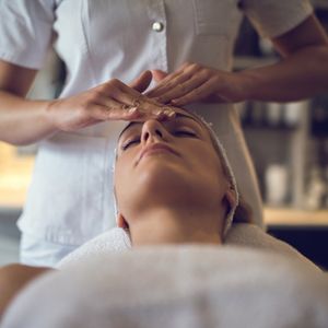 Woman Having a Facial Massage — Florence, AL — Oasis Day Spa & Salon