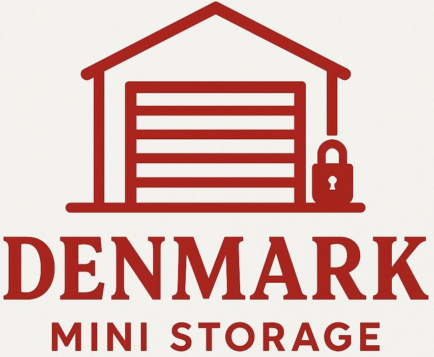 Logo of Denmark mini storage, red text on white background.