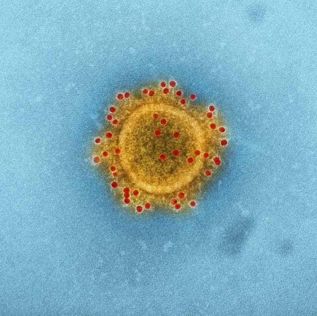 COVID-19 virus on a microscopic scale with IV drip - mobile iv therapy for covid near me