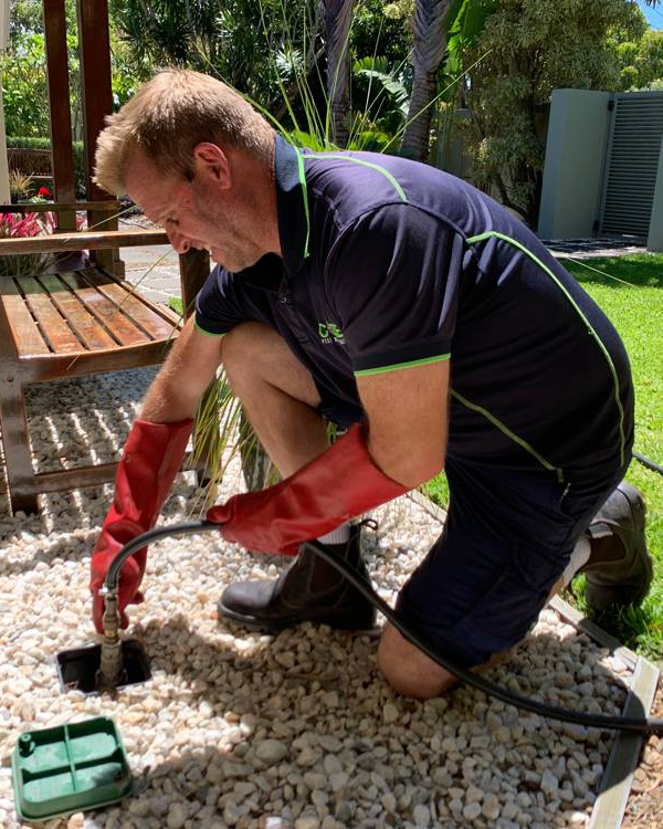 Pest Control Technician Applying Pesticides — Pest Management in Sippy Downs, QLD