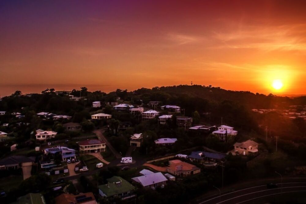 An Aerial View of a Sunset Over a Residential Area — Core Pest Management in Bli Bli, QLD