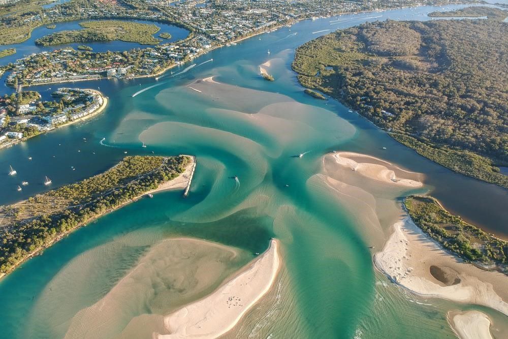 An Aerial View of a Large Body of Water Surrounded by Islands — Core Pest Management in Noosa Heads, QLD