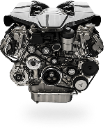 Silver engine with multiple belts and pulleys. | Michael's Auto Service