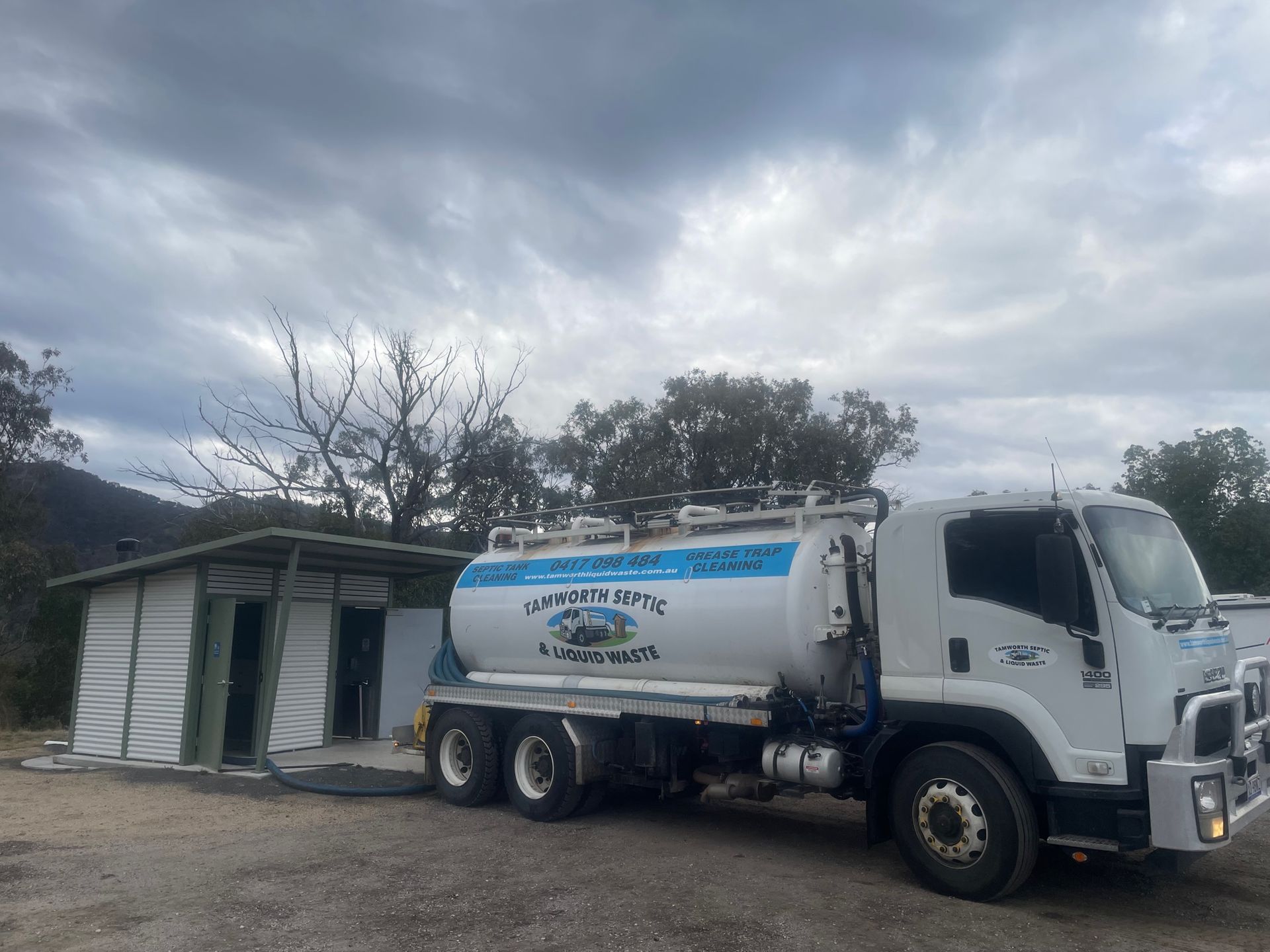 Company Service Truck in Residential Area — Tamworth Septic & Liquid Waste in Duri NSW