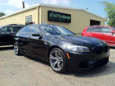 Mid range cars in front of a2 office — Ann Arbor, MI — A2 Auto Image