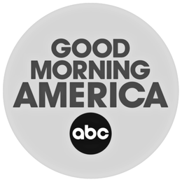 A grayscale logo for the television program Good Morning America, featuring the show's title above the circular abc logo.