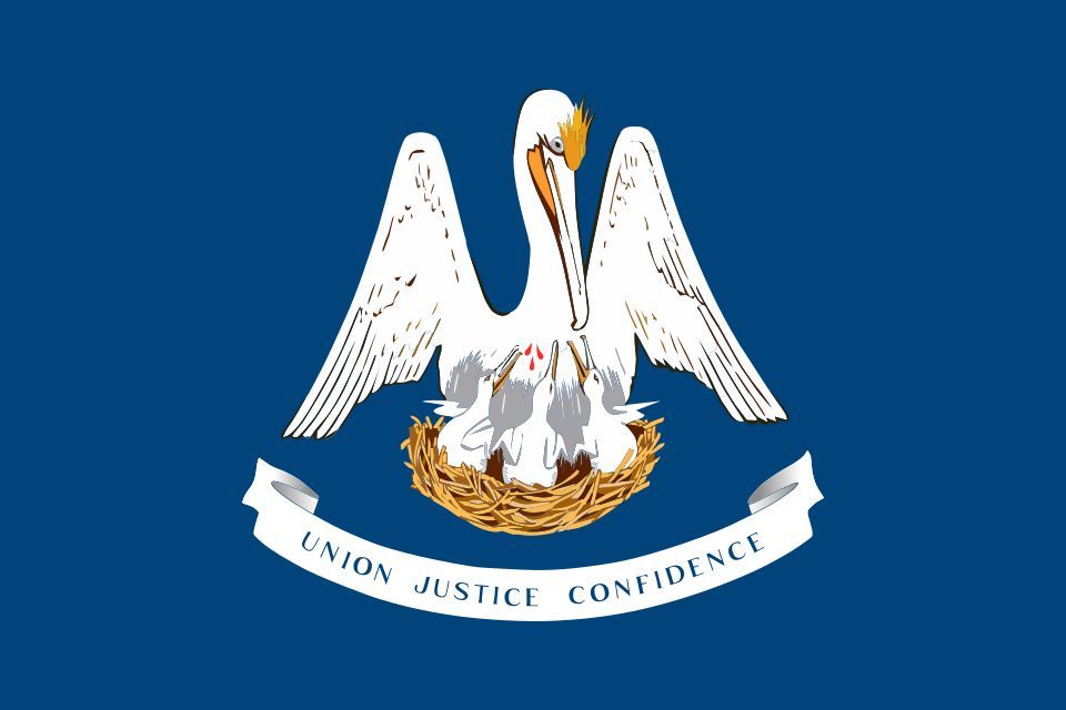 Flag of Kentucky: navy field with the Commonwealth seal — two figures clasping hands above the motto 'United We Stand, Divided We Fall' — encircled by goldenrod.