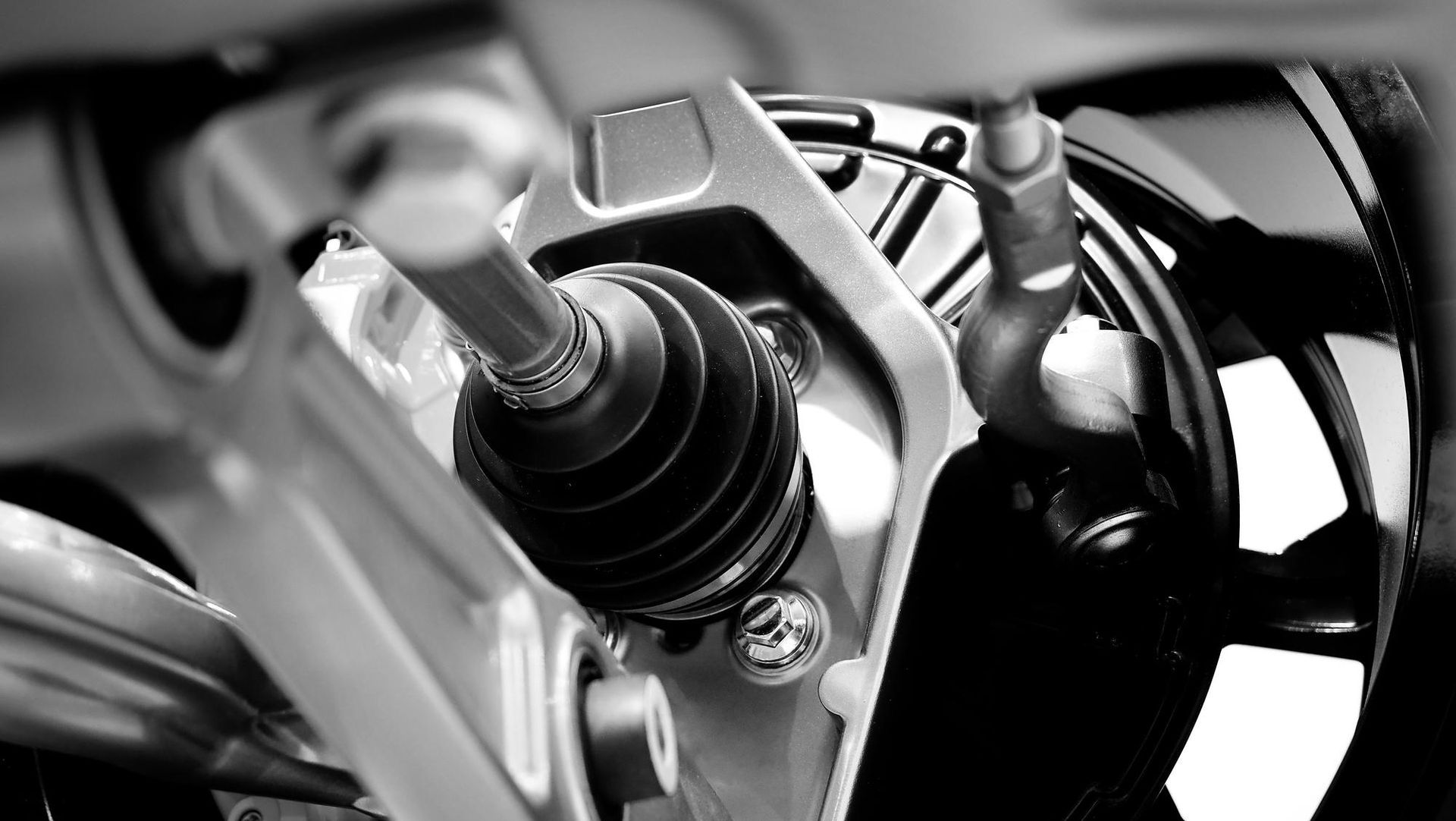 A black and white photo of a suspension system on a car.