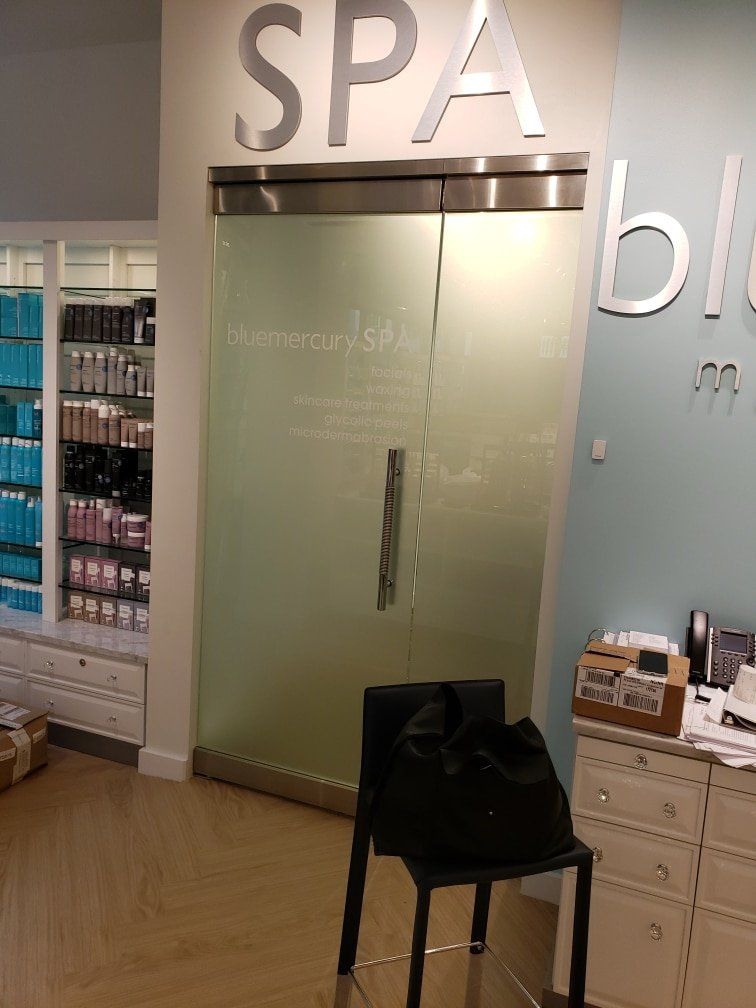 Spa entrance with frosted glass door, 