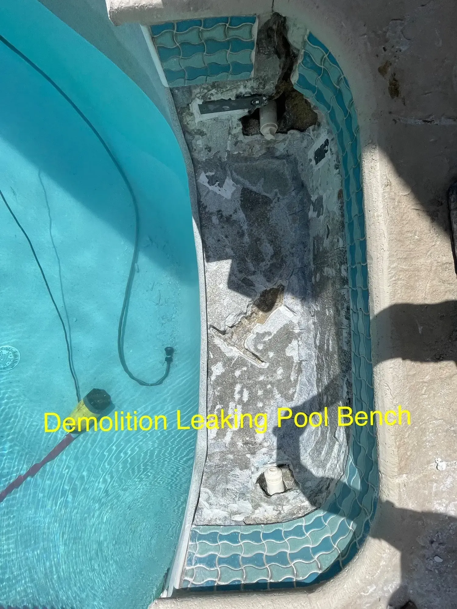 H20 Leak Solution- A swimming pool with a hole in the side of it.