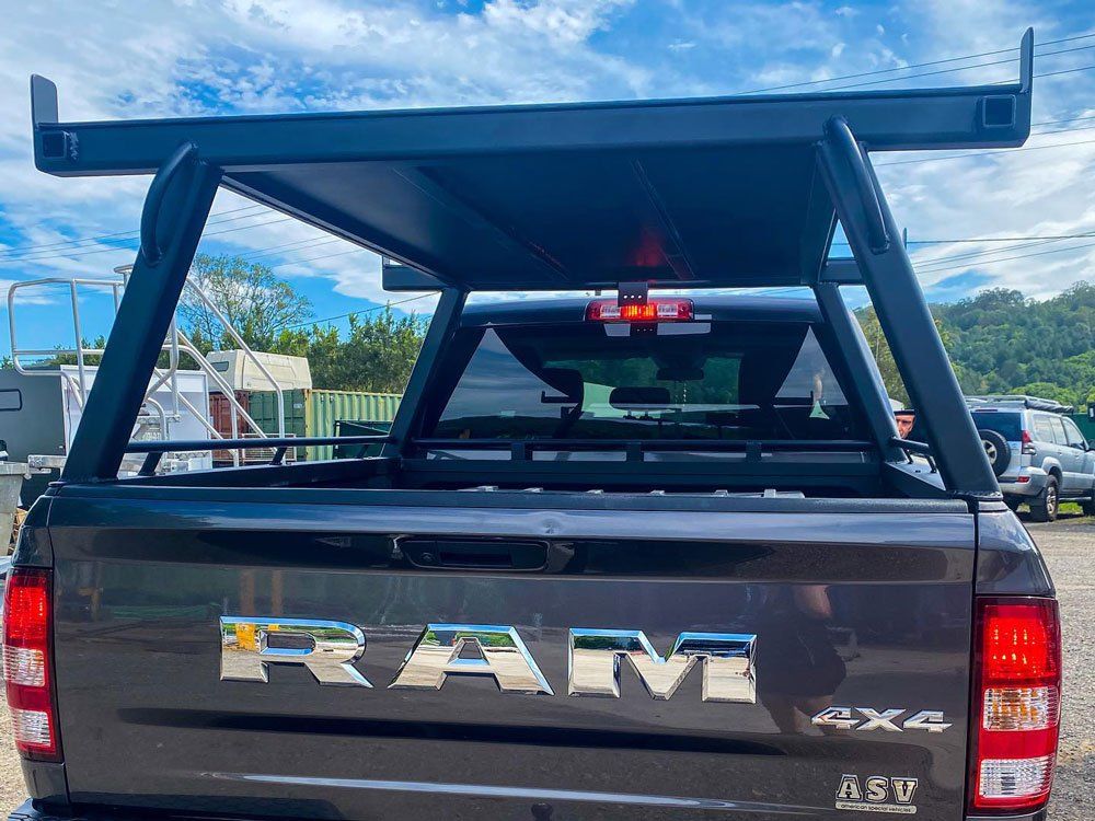 4X4 Ram Black Vehicle With Canopy Roof — Trailers on the Sunshine Coast